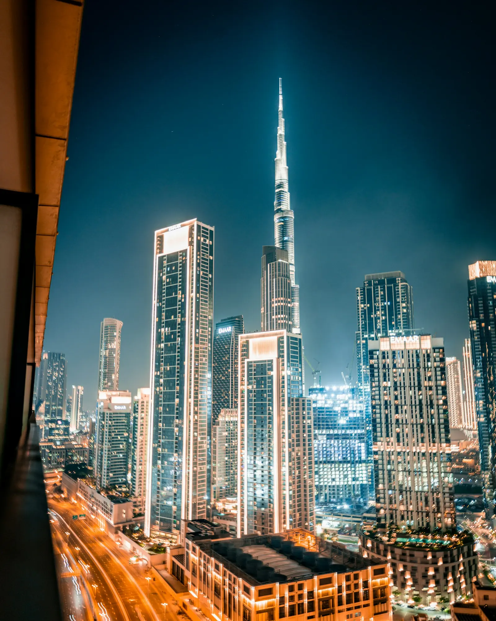 Dubai's skyline at night with the Burj Khalifa